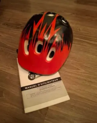 Moto infantil azul y blanca Vespa