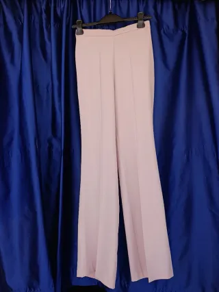 Tailleur donna rosa con piume