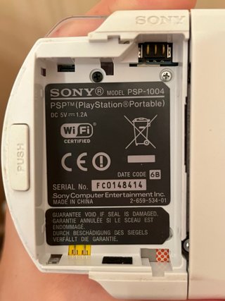 PSP Blanca + Cargador + Accesorios + Juegos