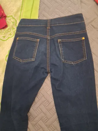 Vaqueros niña oscuros