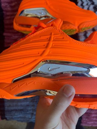 Nike NOCTA Naranja Plata