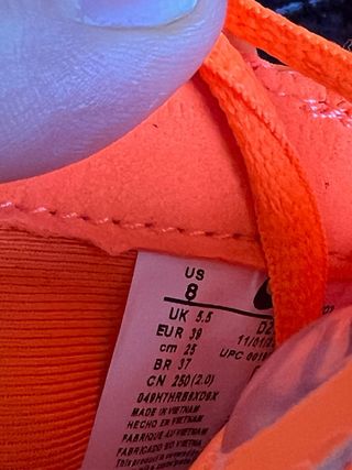 Nike NOCTA Naranja Plata