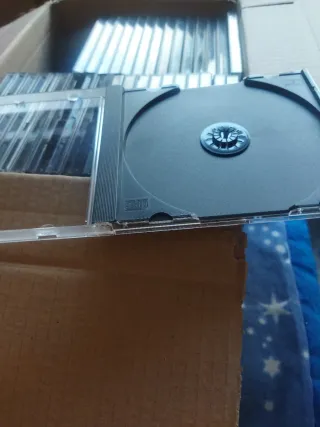 Cajas de CD (aprox. 100) - Algunas dobles
