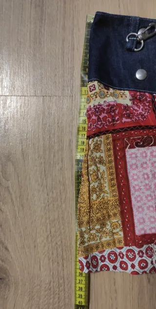 Falda vaquera mini con monedero