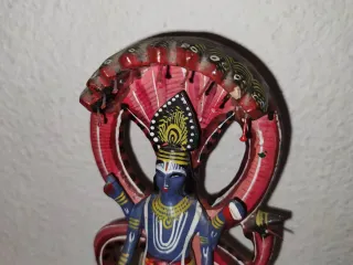 Figura Vishnu con serpiente Naga
