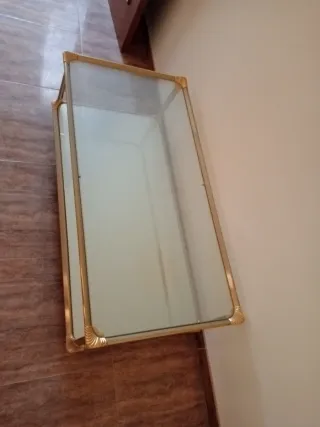 Mesa de centro cristal y metal dorado