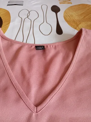 Blusa rosa mujer manga con volantes