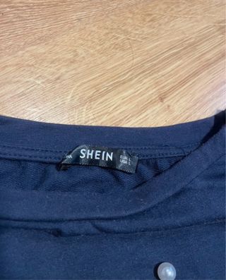 Sudadera azul con perlas