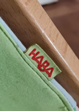 Passeggino per bambole Haba in  legno e stoffa