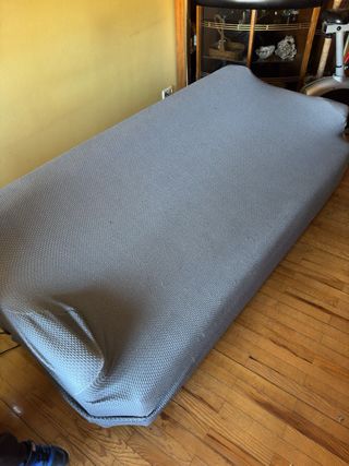 Sofá cama gris azulado Ni idea de marca ni tela