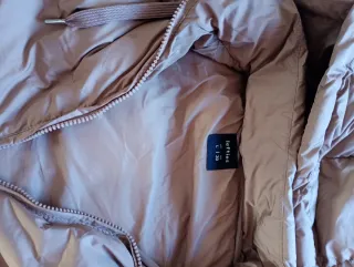 Chaleco acolchado con capucha marrón