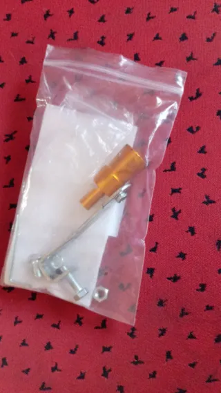 Objeto para hacer ruido en escape