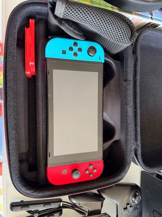 Nintendo Switch + Juegos y Accesorios