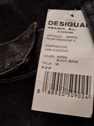 Falda Desigual  vaquera con etiqueta