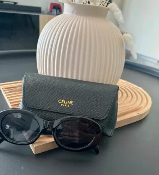 Gafas de sol Celine negras y doradas