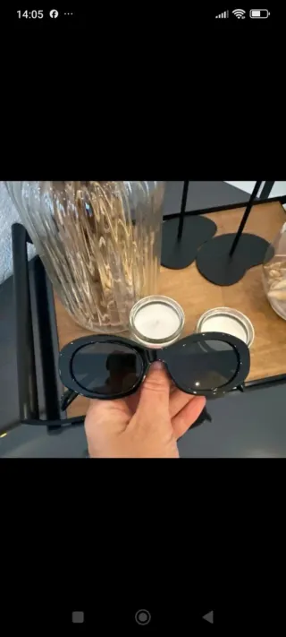 Gafas de sol Celine negras y doradas