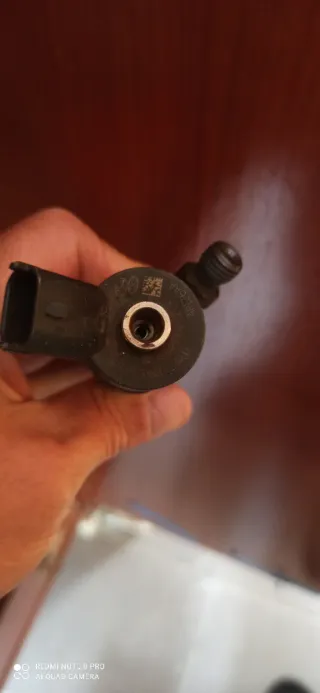 Inyector Kia Carens 2010