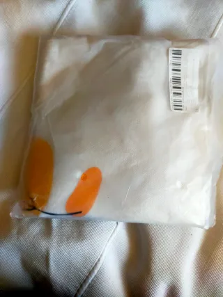 Bolsa de lona blanca con estampado botánico
