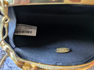 Bolso fiesta Zara dorado metalizado