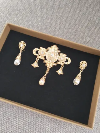 Aderezo y pendientes niña oro