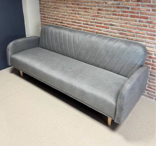 Sofá cama gris de tela