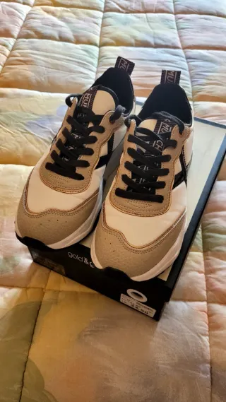 Sneakers Munich pelle oro e bianche
