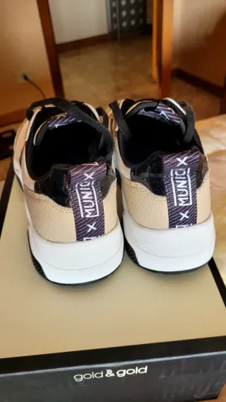 Sneakers Munich pelle oro e bianche