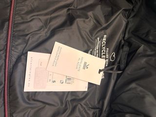 Plumifero mujer negro