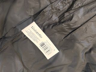 Plumifero mujer negro