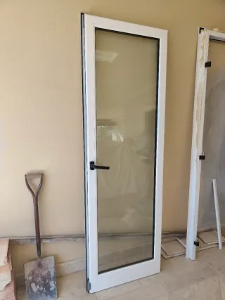 Puerta aluminio doble cristal