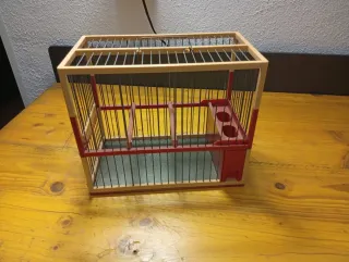 Jaula para pájaros de madera y metal