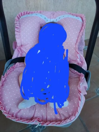 Maxi-Cosi rosa lunares