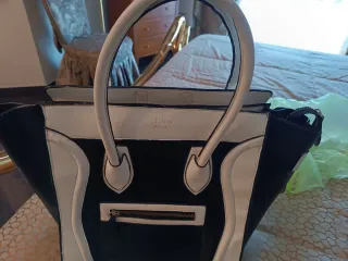 Particolare e bellissima borsa in pelle B/N