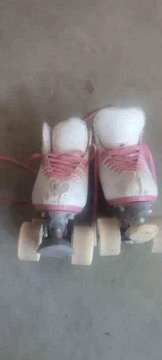 Patines artísticos 4 ruedas blancos y rosas