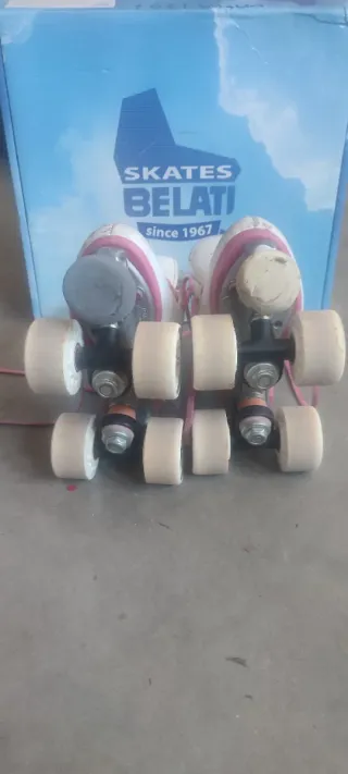 Patines artísticos 4 ruedas blancos y rosas