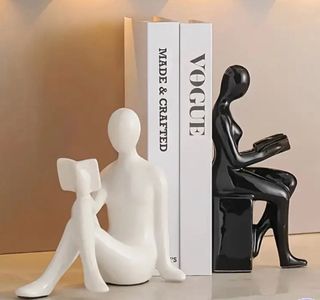 Fermalibri Scultura Seduta Uomo Donna