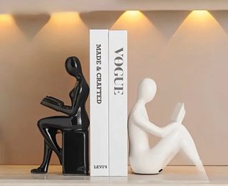 Fermalibri Scultura Seduta Uomo Donna