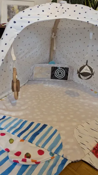 Alfombra de actividades Lovevery