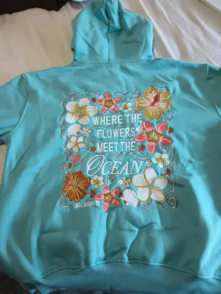 Sudadera con bordado floral y texto