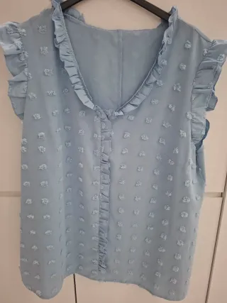 Shorts neri con perle e pizzo