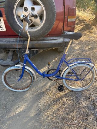 Bicicleta plegable azul antigua