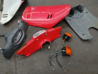 Carcasas y piezas Honda Vision 75