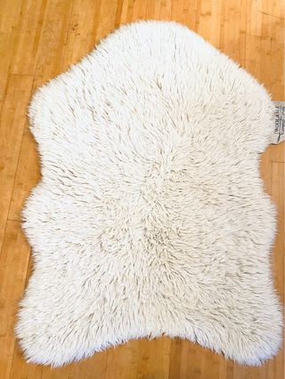 Alfombra de lana blanca como nueva 75x110
