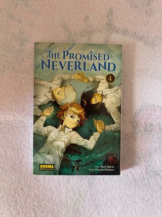 Mangas de The promised neverland, tomos 1, 2 y 4