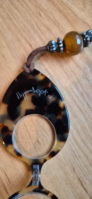 Colgante lupa carey con cadena