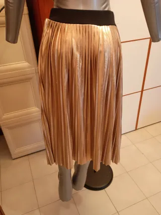 Gonna oro plissettata