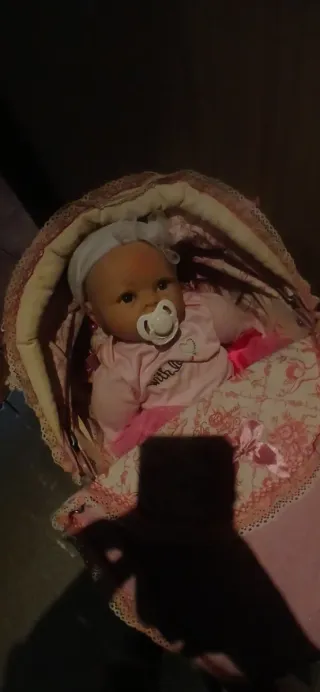 Coche de muñecas rosa