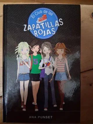 3 libros zapatillas rojas