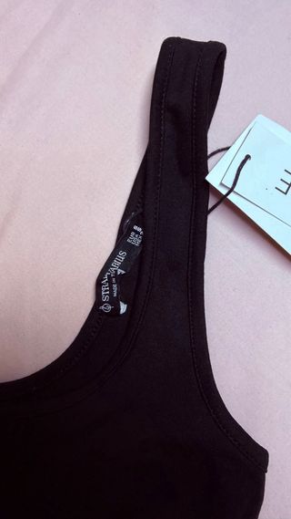 Top negro con transparencias