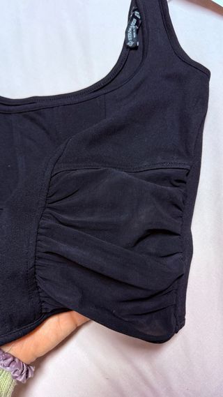 Top negro con transparencias